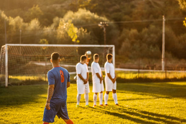 istock Soccer player taking free kick 1310476569