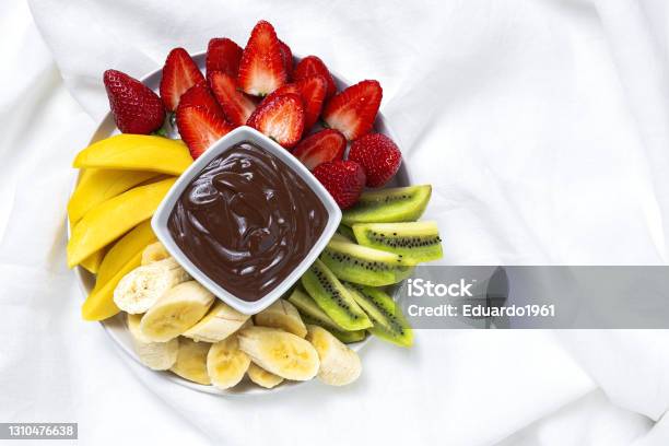 Dish Of Fruits With Chocolate Ready To Eat Take Away Stock Photo - Download Image Now