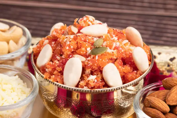 Photo of Festive Mithai Gajar Ka Halwa Halva Or Carrot Pudding Gajrela Halua Made Of Grated Carrots Milk Cream Meetha Mava Sugar Desi Ghee Khoya Mawa Badam Kaju Is Enjoyed In Festivals Like Holi Diwali And Eid