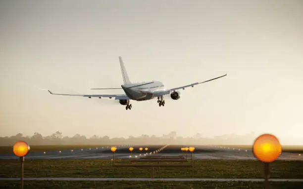 Computer generated image of a passenger airplane landing on airstip. Aircraft landing on runway in morning.