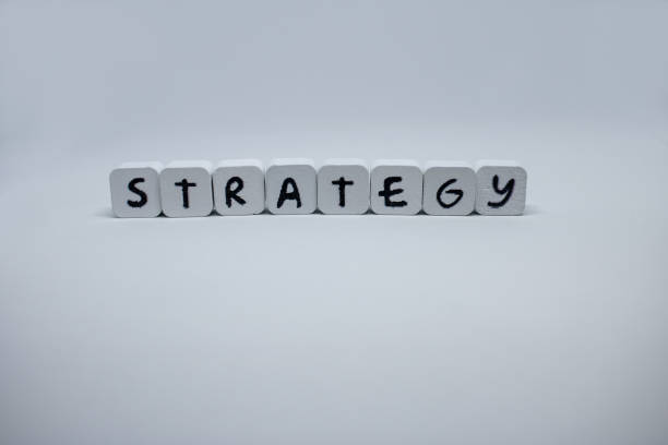 Strategy Word on wooden white blocks ,Web Page, Plan, Writing, Cube Shape, Text Messaging