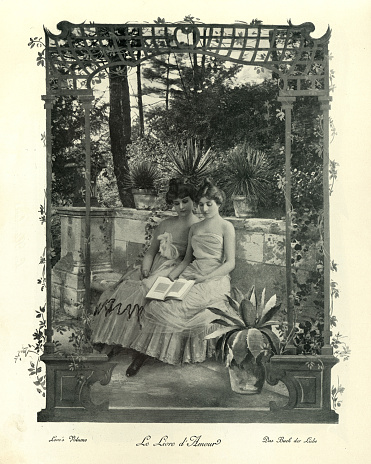 Antique photomontage photograph, Young women reading a romance novel, book of love, Victorian, 19th Century.