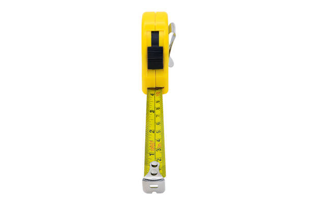 istock Yellow tape measure isolated on white background 1310483038