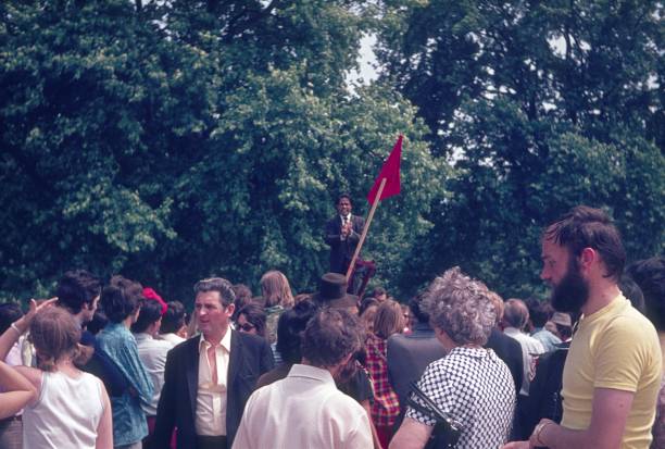 London, England, UK, 1974. A man speaks at Speaker Corner to an interested audience in Hyde Park.