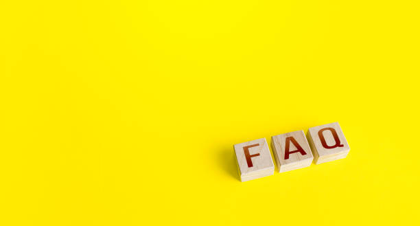 istock Blocks with the word abbreviation FAQ (frequently asked questions) on a yellow background. Answers explanations for users and customers. Instructions and rules. Guide and navigation. Tips and comments 1310484523