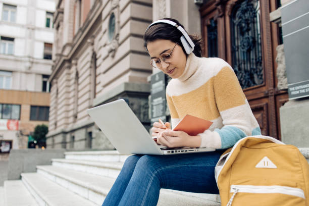 istock Beautiful student preparing for her exam in front of her university 1310493416