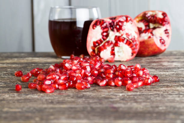 istock red and ripe fruit pomegranate with red grains 1310494180