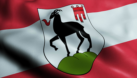 3D Illustration of a waving Austria city flag of Gotzis