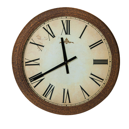 A beautiful, ornate, antique clock face, with in old-style pendulum