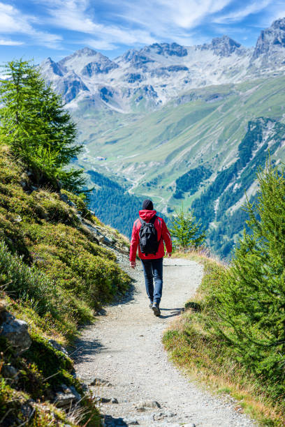istock Young hikers on the Muragl valley in the area St.Moritz. 1310498790