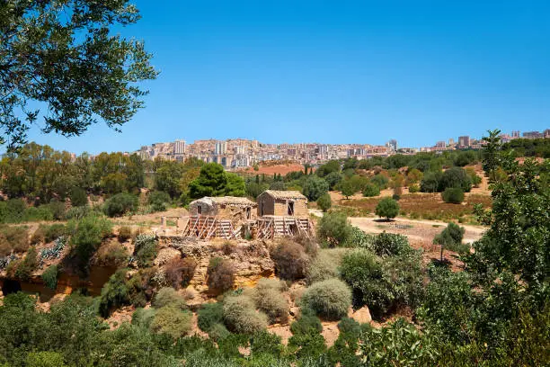 Photo of Farm houses in Kolymbethra Gardens, or Jardino della Kolymbethra. magnificent green garden in the heart of the Valley of Temples, Agrigento, Sicily, Italy