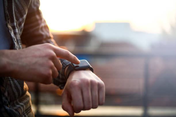 istock Touching The Smart Watch And Technology 1310499858