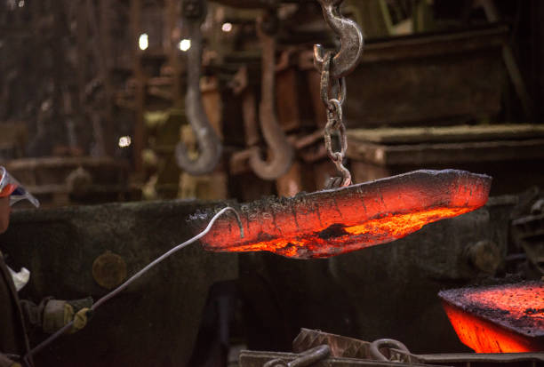 istock Steelworker at work at a steel mill 1310503555