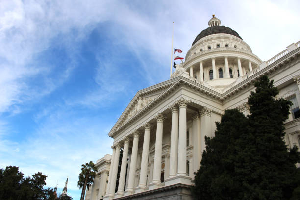 California State Capitol Building in Sacramento California California State Capitol Building in Sacramento, California. Flag flown at half mast sacramento photos stock pictures, royalty-free photos & images