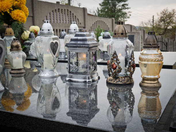 istock Candles on the grave 1310510226