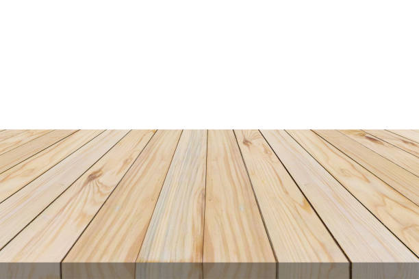 istock Empty wooden table top isolated on white background for product display montage 1310511748