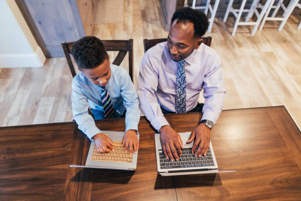 istock A Young Boy Wants to Be Like Dad 1310514072