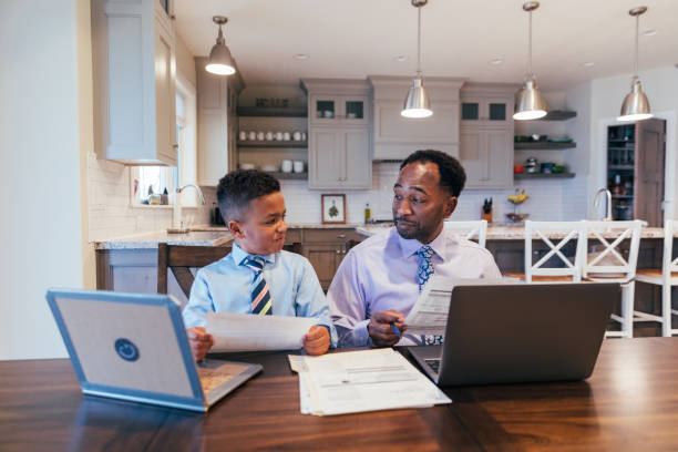 istock A Young Boy Wants to Be Like Dad 1310514078