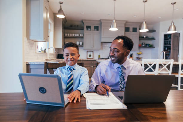 istock A Young Boy Wants to Be Like Dad 1310514085