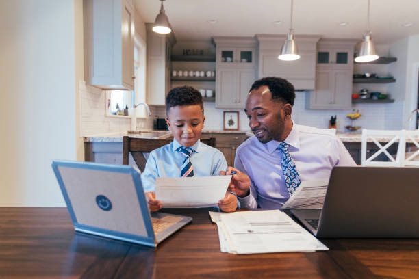 istock A Young Boy Wants to Be Like Dad 1310514097