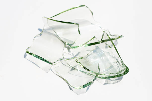 istock Glass shards isolated on white background. 1310516350