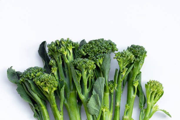 istock Green baby broccoli on white background. 1310516972