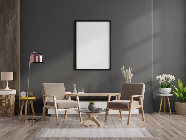 istock Poster mockup with vertical frames on empty dark wall in living room interior with velvet armchair. 1310518422