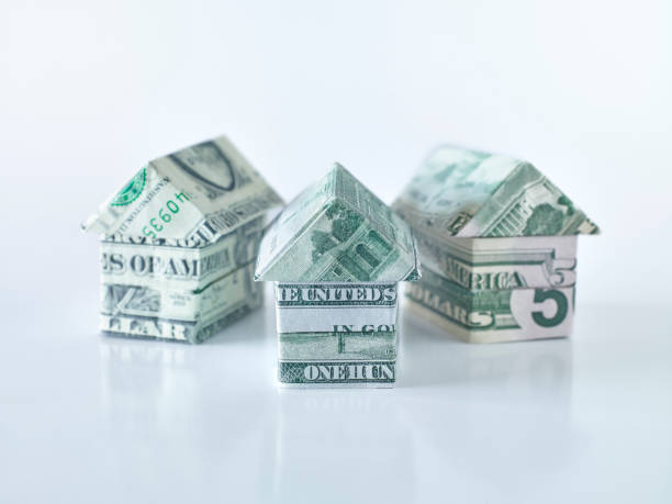 istock Origami dollar houses 1310519329