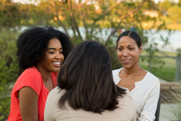 istock Multi-ethnic group of women laughing and talking. 1310523818