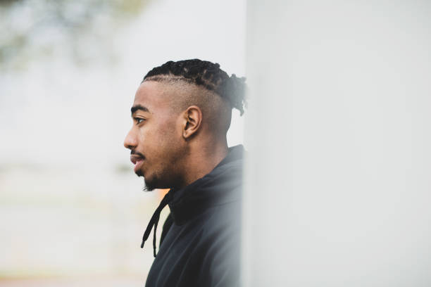 istock Young African American man outside wearing a hoddie. 1310524748