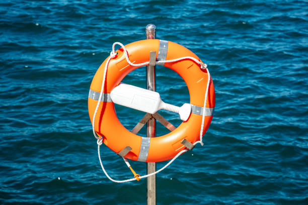 Life Buoy On Blue Background. 3d rendering stock photo
