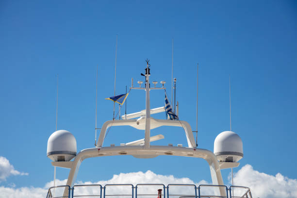 istock Yacht rooftop, satellite radar, antennas background marina Flisvou, Greece. 1310534148