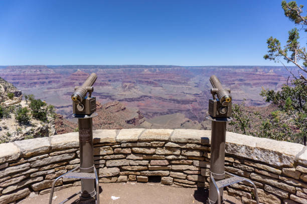 istock Looking at the Grand Canyon through a telescope 1310534205