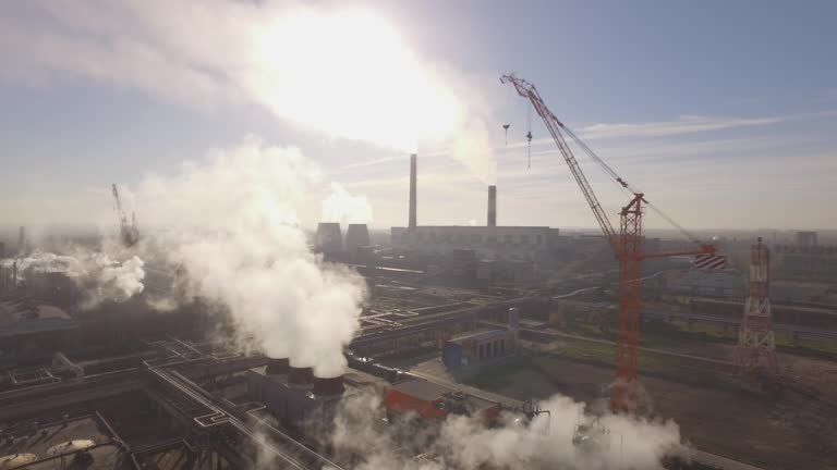 Flying above chemical plant top view