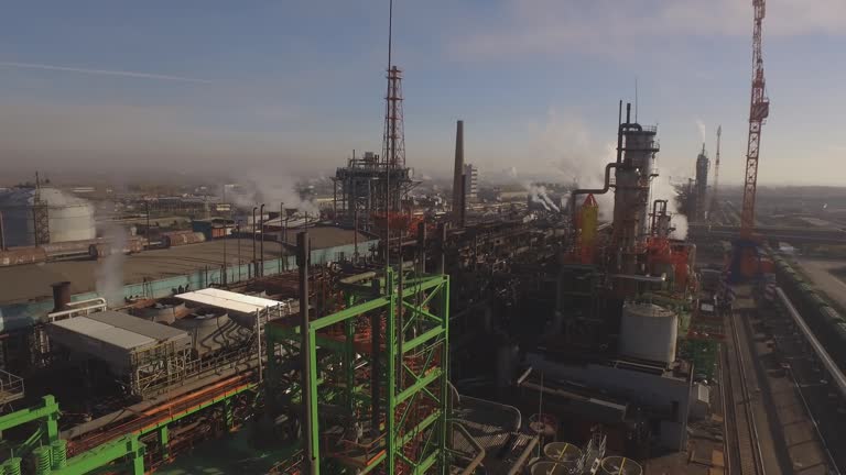 Flying above chemical plant top view