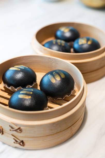 istock Steamed charcoal buns with pumpkin sauce 1310560910
