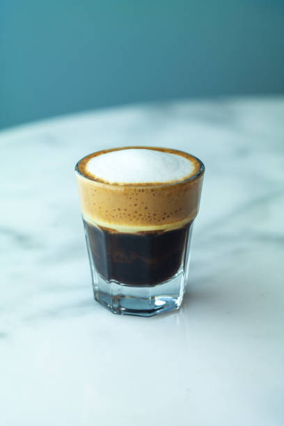 istock A Frothy Dark Fresh Cup of Coffee On the Table 1310561493