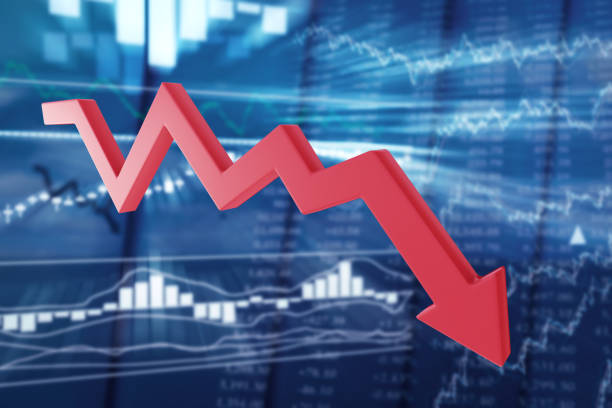 istock Falling red arrow on blurred of stock quotes 1310563039