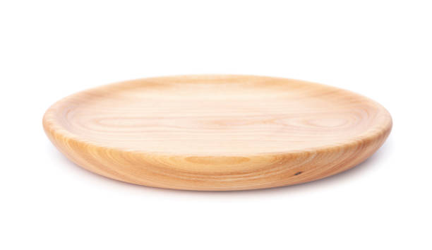 istock Empty wooden plate or round board isolated on white background. Rustic dish 1310563681