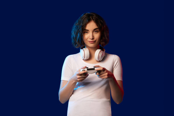 istock girl playing video games on the console 1310563683