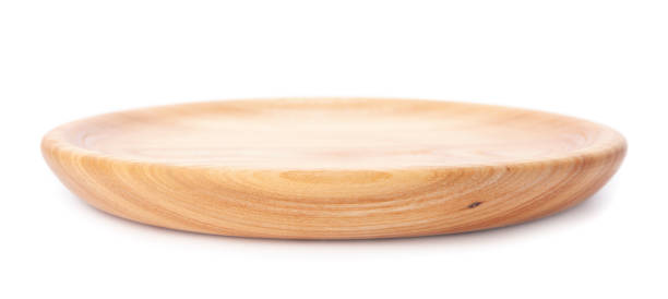 istock Empty wooden plate or round board isolated on white background. Rustic dish 1310563686