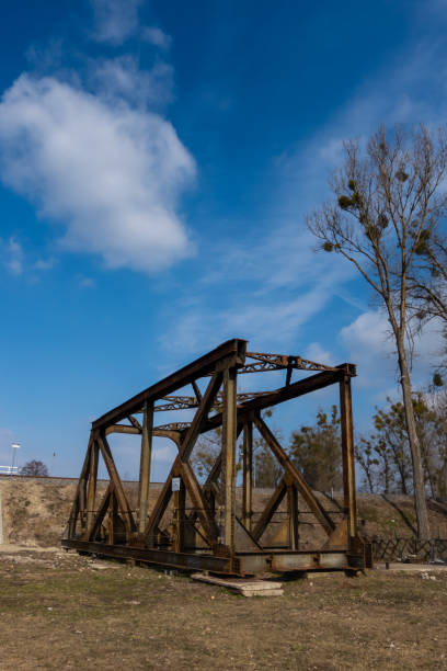 istock Rusty spans of the old railway bridge have been dismantled. 1310563756