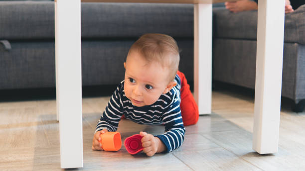 istock Beautiful baby boy under the table 1310564052