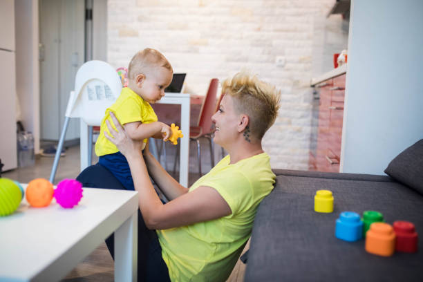 istock Mother playing with her cute baby boy. 1310564664