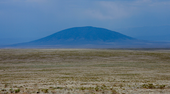 Horizontal landscape photo of the mountain that inspired the artist, Georgia O'Keefe, near Taos, New Mexico