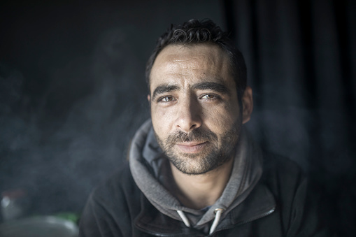 Portrait of middle eastern refugee