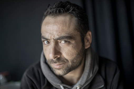 Portrait of middle eastern refugee