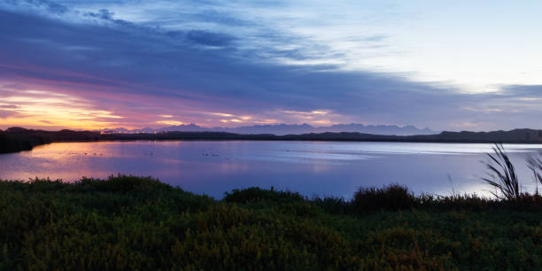 istock Sunrise over False Bay Nature Reserve 1310573498