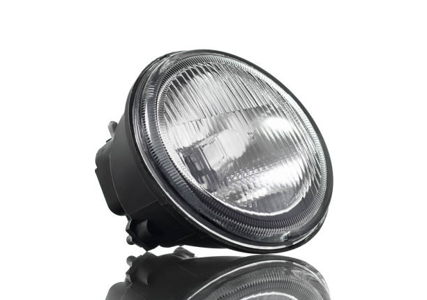 istock Car's fog headlight isolated on white background. 1310574291