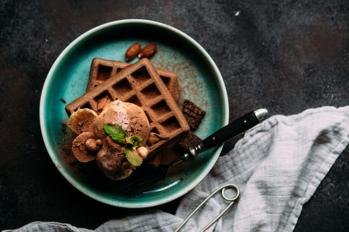 Belgian chocolate waffles with ice cream in a plate